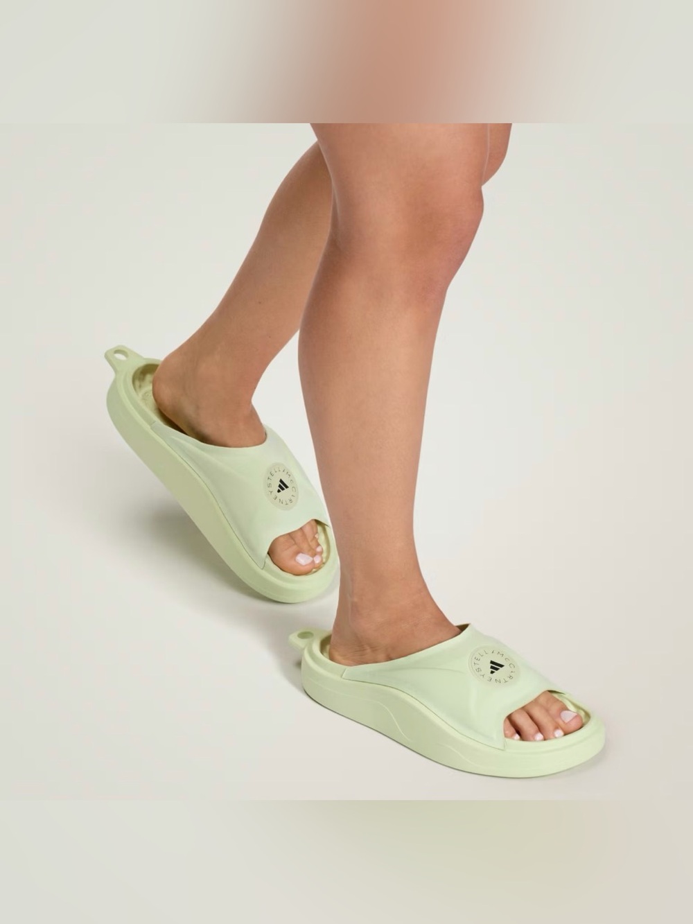 Stella McCartney x Adidas
Women's Size 9 Halo Carbon
Light Green Slides JI1217